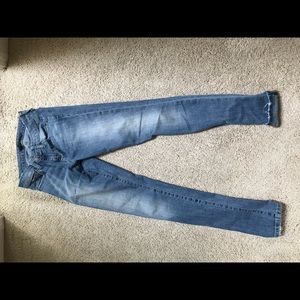 Joe’s mid-rise distressed skinny jeans